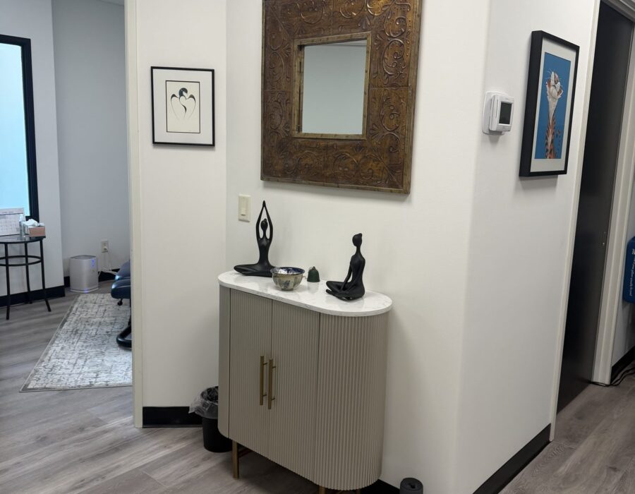Hallway with mirror and meditation figures